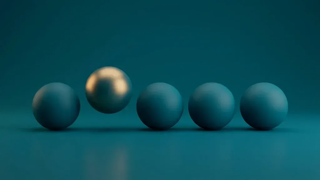 Five matte teal spheres in a row on a dark teal studio floor, one lifted slightly above the line and catching a warm gold highlight.